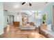 Cozy living room featuring a ceiling fan, staircase, and comfortable seating arrangements at 119 Oakbluff Rd, Summerville, SC 29485