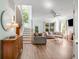 Bright and airy living room with hardwood floors and a staircase at 119 Oakbluff Rd, Summerville, SC 29485