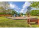 Community playground featuring slides, swings, and play structures at 119 Oakbluff Rd, Summerville, SC 29485