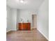 The room features wood flooring, light-colored walls, and a stylish wooden dresser at 119 Oakbluff Rd, Summerville, SC 29485
