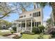 Attractive two-story home with a charming front porch, well-kept landscaping, and classic curb appeal at 12 Leeann Ln, Mount Pleasant, SC 29464