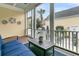 Cozy screened porch featuring comfortable seating and outdoor views at 12 Leeann Ln, Mount Pleasant, SC 29464