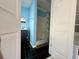 Bathroom featuring black tile flooring, a standing shower, and a blue wall at 130 Oak Crest Dr, Moncks Corner, SC 29461