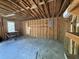Unfinished garage interior showcasing wooden framing and concrete flooring at 130 Oak Crest Dr, Moncks Corner, SC 29461