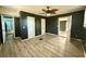 Spacious living room with modern flooring, neutral gray walls, and multiple doorways for easy flow at 130 Oak Crest Dr, Moncks Corner, SC 29461