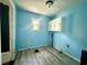 Room with cabinets, wood floor, and a window that brings in natural light at 130 Oak Crest Dr, Moncks Corner, SC 29461