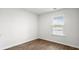 A brightly lit room with durable laminate flooring and natural light at 131 River Hill Rd, Goose Creek, SC 29445