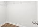 Empty walk-in closet with wood-look floors and white walls ready for the homeowner's storage solutions at 131 River Hill Rd, Goose Creek, SC 29445