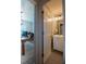 A view of the bathroom which features a white vanity and sink, with an adjoining office visible at 1400 Harbor Mist Ct, Charleston, SC 29492