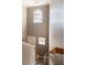 Bright foyer with high ceilings and a unique window, leading to the staircase and upper levels at 1400 Harbor Mist Ct, Charleston, SC 29492