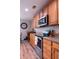 This view shows a kitchen area with granite counter tops and a stainless steel stove and microwave at 1400 Harbor Mist Ct, Charleston, SC 29492