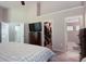 Spacious main bedroom offering a walk-in closet, a television, and ensuite bathroom at 1400 Harbor Mist Ct, Charleston, SC 29492