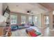 Bright play room featuring natural light, a play area, and access to the backyard at 1400 Harbor Mist Ct, Charleston, SC 29492