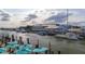 Scenic aerial view of a waterfront restaurant with boats docked along the harbor and outdoor seating at 1416 Dahlia Dr, Mount Pleasant, SC 29464