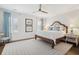 Comfortable bedroom with a ceiling fan, shuttered windows, and neutral decor for a relaxing atmosphere at 1479 Mossy Branch Way, Mount Pleasant, SC 29464