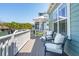 Spacious back deck with seating and partial view of yard at 1479 Mossy Branch Way, Mount Pleasant, SC 29464