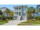 Charming two-story coastal home with double porches and manicured landscaping at 1479 Mossy Branch Way, Mount Pleasant, SC 29464