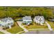 Beautiful aerial view of the neighborhood with well-maintained homes, pools, and lush green landscaping at 1529 Tomato Farm Cir, Mount Pleasant, SC 29464