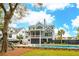 The luxurious backyard includes a pool, patio furniture, and landscaping at 1529 Tomato Farm Cir, Mount Pleasant, SC 29464