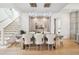 Elegant dining room featuring stylish lighting and a modern table with seating for six at 1529 Tomato Farm Cir, Mount Pleasant, SC 29464