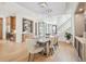 Open concept dining area with a modern wine storage and staircase, ideal for entertaining at 1529 Tomato Farm Cir, Mount Pleasant, SC 29464