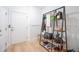 Organized entryway featuring a metal shoe rack and a storage bench at 1529 Tomato Farm Cir, Mount Pleasant, SC 29464