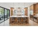 Spacious kitchen with wooden cabinetry, stainless steel appliances, and a large center island at 1529 Tomato Farm Cir, Mount Pleasant, SC 29464
