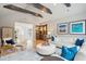 Open living area boasting wood beams, built-in bar, and stylish furniture at 1529 Tomato Farm Cir, Mount Pleasant, SC 29464
