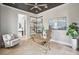 Stylish office with wood floors, ceiling fan, and glass doors leading to other parts of the house at 1529 Tomato Farm Cir, Mount Pleasant, SC 29464