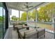 Spacious screened porch with stylish furniture, perfect for enjoying the outdoors at 1529 Tomato Farm Cir, Mount Pleasant, SC 29464