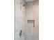 Modern shower featuring neutral tile, a built-in niche, and sleek fixtures at 1529 Tomato Farm Cir, Mount Pleasant, SC 29464