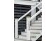Stylish exterior staircase with modern railings and the house number displayed on the post at 1529 Tomato Farm Cir, Mount Pleasant, SC 29464