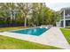 A stunning backyard pool area features a playground and luxurious outdoor furniture at 1529 Tomato Farm Cir, Mount Pleasant, SC 29464