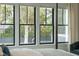 The window offers a natural view with its black trim and ample sunlight that fills the room at 1529 Tomato Farm Cir, Mount Pleasant, SC 29464