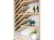Close-up showcasing the modern wine rack with elegant glassware and decorative elements at 1529 Tomato Farm Cir, Mount Pleasant, SC 29464