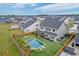 Aerial view of the home showcasing a large private yard, pool, and patio in a Gathering-friendly neighborhood at 158 Garden Lily Ln, Summerville, SC 29485