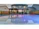 Beautiful pool reflecting the house lights at dusk at 158 Garden Lily Ln, Summerville, SC 29485