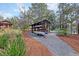 Canoe and kayak rack with several boats, offering easy access to water activities near a lake or river at 158 Garden Lily Ln, Summerville, SC 29485