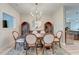Charming dining room with modern chandelier and seating for six at 158 Garden Lily Ln, Summerville, SC 29485