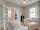 Cozy living room featuring a ceiling fan and plenty of natural light at 158 Garden Lily Ln, Summerville, SC 29485