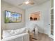 Comfortable living room featuring plush seating, a wall-mounted TV, and stylish decor providing a relaxing atmosphere at 158 Garden Lily Ln, Summerville, SC 29485