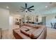 Spacious living room features a large sectional sofa and an open-concept design at 158 Garden Lily Ln, Summerville, SC 29485