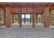 Spacious outdoor pavilion with brick columns and ceiling fans, offering a perfect space for gatherings at 158 Garden Lily Ln, Summerville, SC 29485
