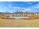 Beautiful pond with fountains and palm trees surrounded by well-maintained lawns in a residential neighborhood at 158 Garden Lily Ln, Summerville, SC 29485