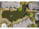 Aerial view of community featuring pond, landscaping, and multiple residential buildings at 1597 Cambridge Lakes Dr # 303E, Mount Pleasant, SC 29464