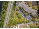 Aerial view of community with mature landscaping, full parking lot and private drive at 1597 Cambridge Lakes Dr # 303E, Mount Pleasant, SC 29464