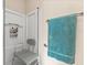 Accessible bathroom with grab bars, shower chair, and handheld shower head at 1597 Cambridge Lakes Dr # 303E, Mount Pleasant, SC 29464