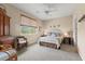 Serene bedroom with soft natural light, neutral tones, and cozy, inviting furnishings at 1597 Cambridge Lakes Dr # 303E, Mount Pleasant, SC 29464