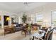Inviting living room featuring classic furniture, abundant natural light, and refined decor at 1597 Cambridge Lakes Dr # 303E, Mount Pleasant, SC 29464