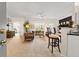 Bright living room showcasing neutral decor, ceiling fan, and an open concept design at 1597 Cambridge Lakes Dr # 303E, Mount Pleasant, SC 29464